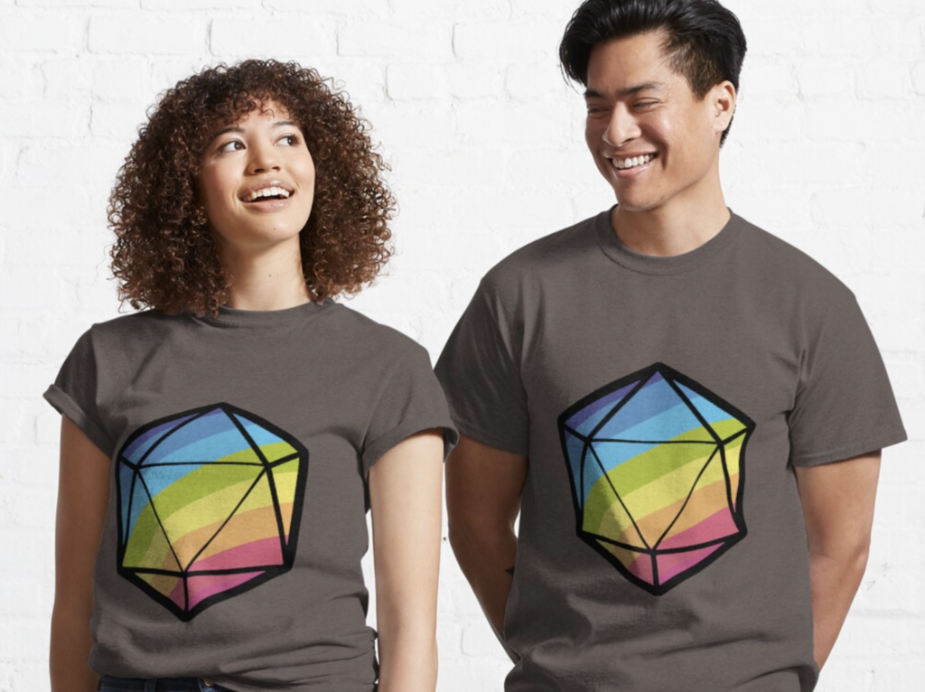 Two beautiful people wearing the Inclusive RPG T-Shirt. It is a rainbow colored 20-sided die. 